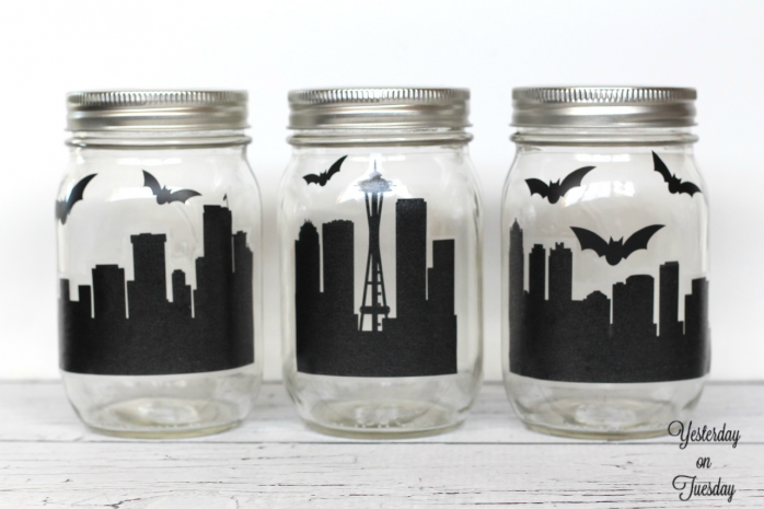 Spooky City Mason Jar Decor: How to transform plain mason jars into a spooky city scene for Halloween.