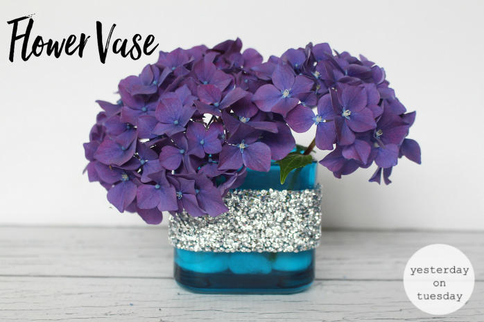 7 Gorgeous Ways to Reuse Glass Candle Holders including a beachy display, flower vase, place to corral glasses, desk set and more!