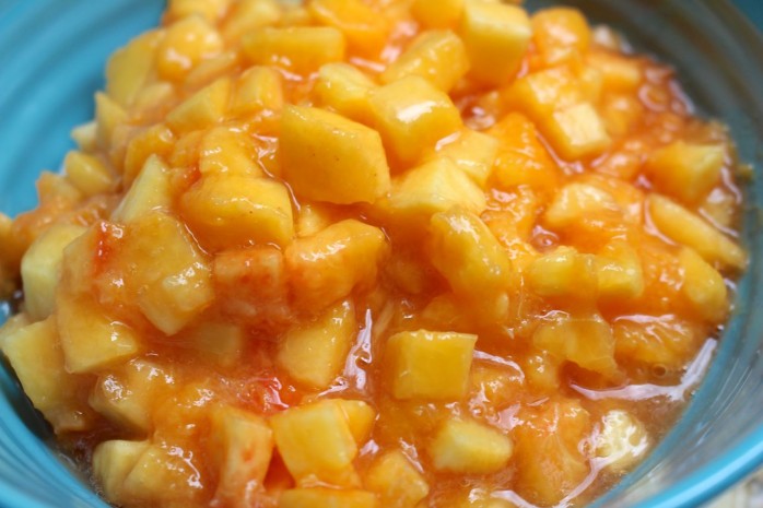 Peach Chipotle Salsa Recipe, one of the featured recipes for Can It Forward Day. Super easy to can and enjoy later! Great with chips.