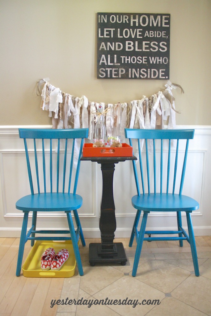 Tips on creating a bench area in your home, using colorful chairs instead! Cool decorating idea.
