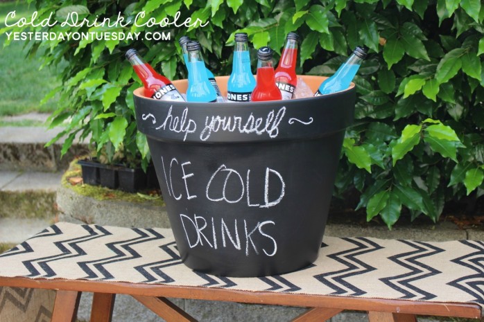 How to transform One Painted Flower Pot into Three Super Summer Hacks including a kid's table, a place for cold drinks and an umbrella stand! Amazing and budget-conscious ideas for summer living and entertaining.