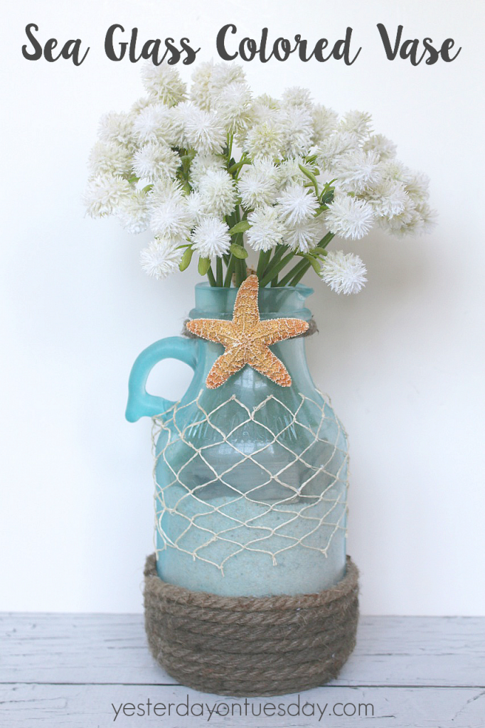 How to transform a plain water jug into a Seaglass Colored Vase. Lovely summer decor idea.