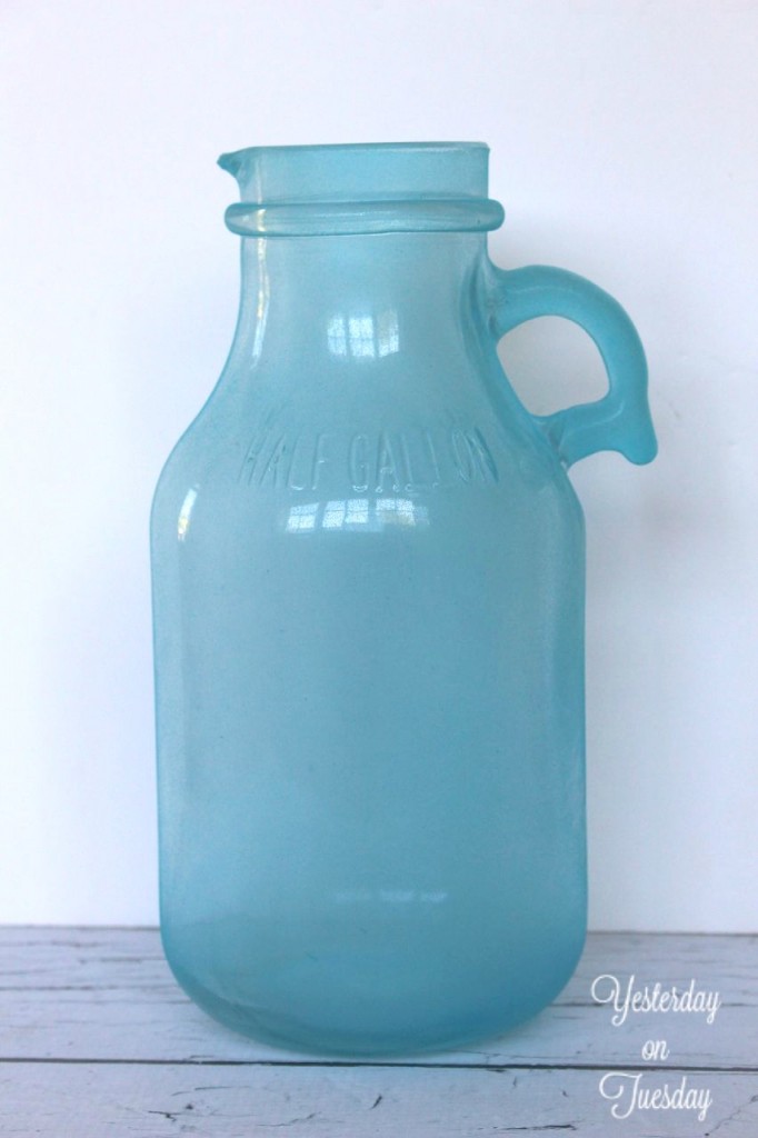 How to transform a plain water jug into a Seaglass Colored Vase. Lovely summer decor idea.