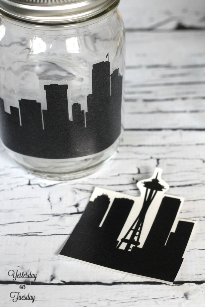 Spooky City Mason Jar Decor: How to transform plain mason jars into a spooky city scene for Halloween.