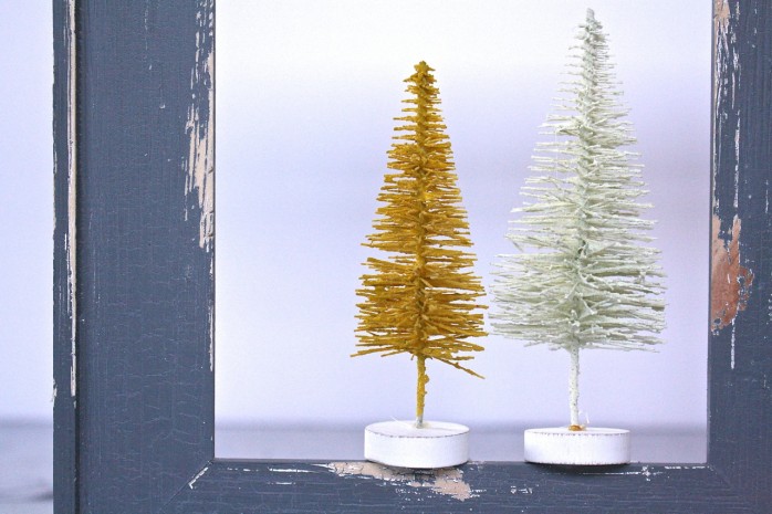 DIY Bottle Brush Tree Frame Decor: Great way upcycle/recycle unused frames. Charming Christmas or holiday decor.