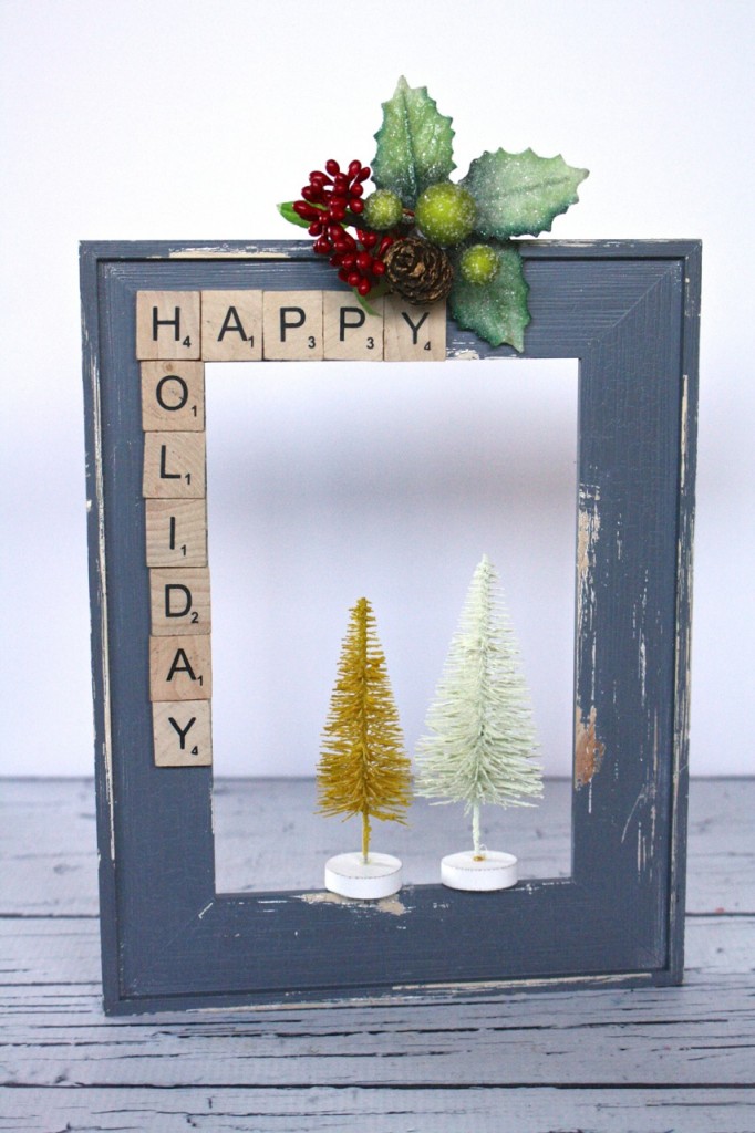 DIY Bottle Brush Tree Frame Decor: Great way upcycle/recycle unused frames. Charming Christmas or holiday decor.