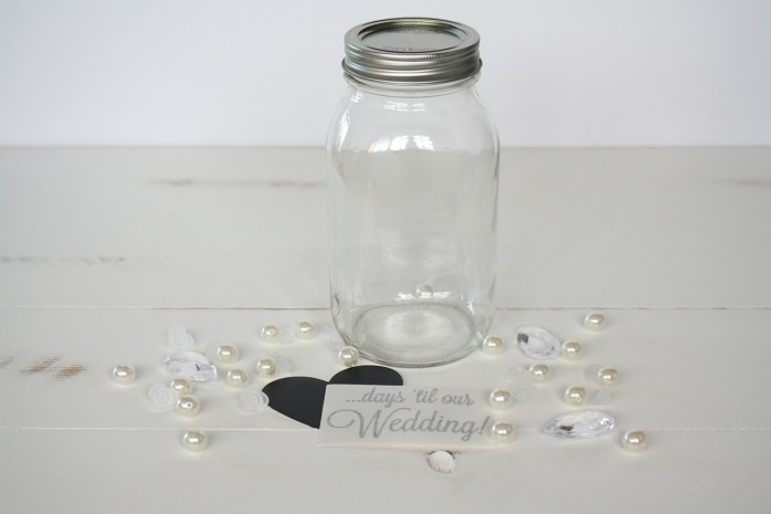 DIY Mason Jar Wedding Countdown Calendar, a thrifty and cute way to count down to the big day for brides, grooms and families!