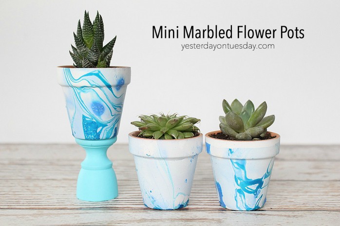 DIY Mini Marbled Flower Pots: How to give your plain flower pots a fun modern twist.