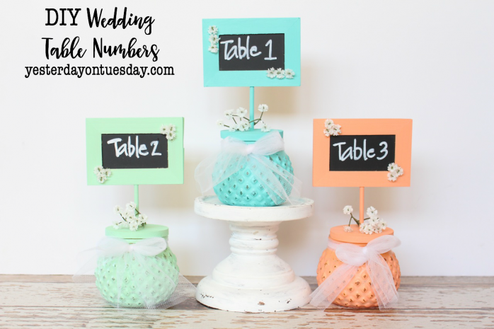 DIY Wedding Table Numbers: How to make rustic table numbers for a wedding, baby shower or any event. Beachy paint colors and a mini chalkboard make this a darling addition to any party.