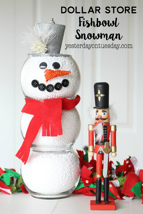 Dollar Store Fishbowl Snowman: Make a darling snowman for holiday decorating, using budget friendly supplies from the dollar store. A charming and easy way to add the spirit of the holidays to your home.